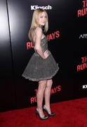 Dakota Fanning Shows Off Her Legs