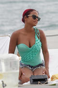 Christina Milian - wearing a swimsuit at a pool in Miami 06/29/13