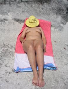 soaking-up-the-sun-on-the-beach-naked--u4hvoxfntm.jpg